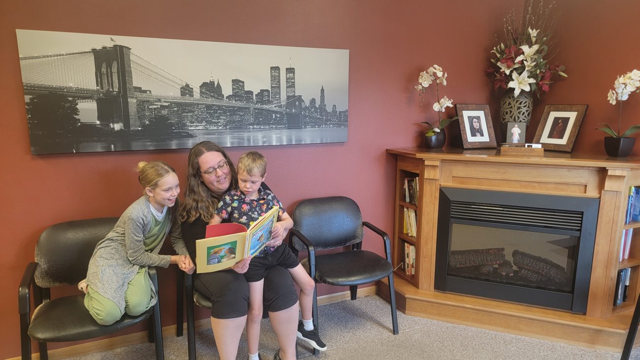 The waiting room — story time by the fireplace